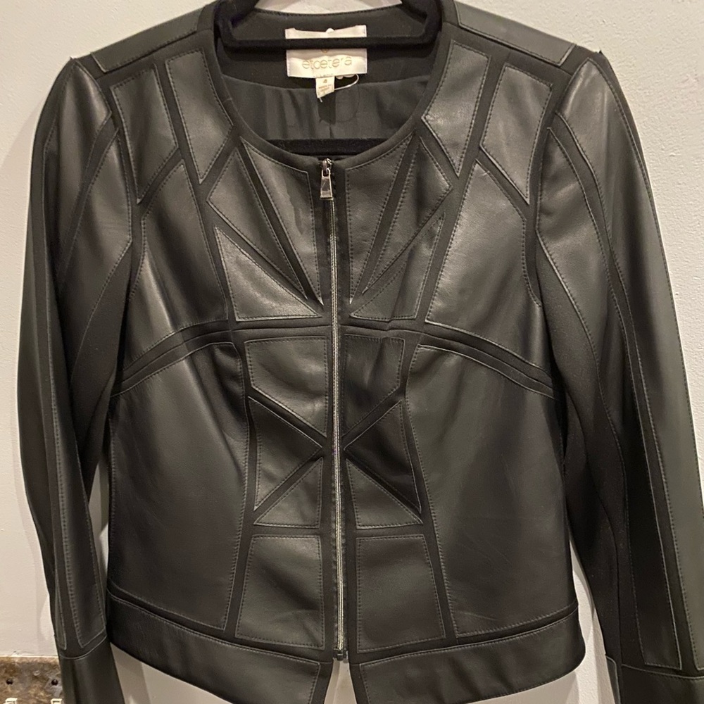 etcetera new black leather jacket, Sz 4 with poly, spandex fabric inserts. Zip